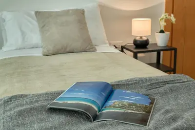 Letto o letti in una camera di IzzHome Everyway