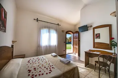Letto o letti in una camera di Hotel Perda Rubia