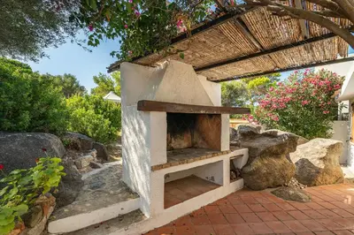 Giardino di Villa Cristina bella villa vista mare e porto turistico Loc Notteri Villasimiuss