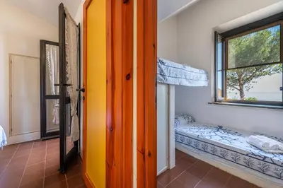 Letto o letti in una camera di Villetta vista mare a 100 mt di distanza