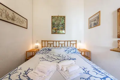 Letto o letti in una camera di Villetta vista mare a 100 mt di distanza