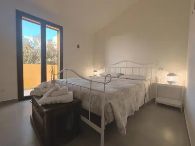 Letto o letti in una camera di Residence Oleandri- Oleandro Rosso