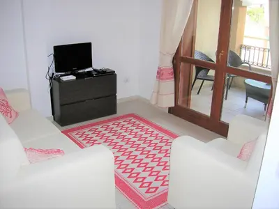 TV o dispositivi per l'intrattenimento presso Appartamento nel cuore di Villasimius 1 piano