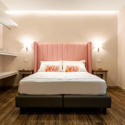 Letto o letti in una camera di Onda Marina Suites
