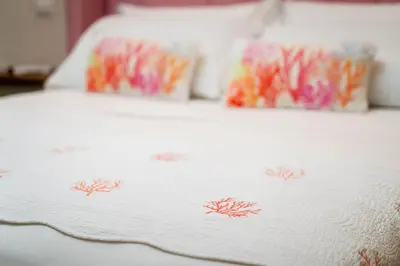 Letto o letti in una camera di Onda Marina Suites
