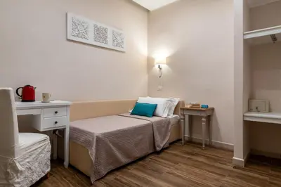 Letto o letti in una camera di Onda Marina Suites