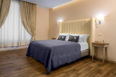Letto o letti in una camera di Onda Marina Suites
