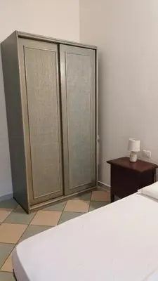 Letto o letti in una camera di Casa Olivo Le ginestre