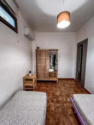 Letto o letti in una camera di Casa Chiara con accesso diretto alla spiaggia