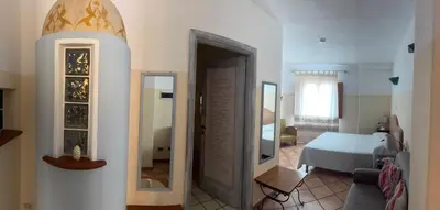Letto o letti in una camera di Villa Madau