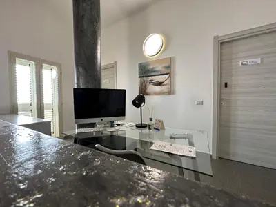 TV o dispositivi per l'intrattenimento presso LXR Rooms Carloforte