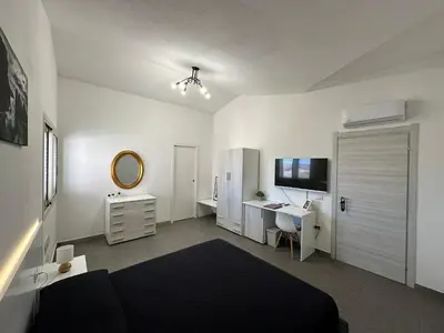 TV o dispositivi per l'intrattenimento presso LXR Rooms Carloforte