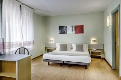 Letto o letti in una camera di Best Western Hotel Residence Italia