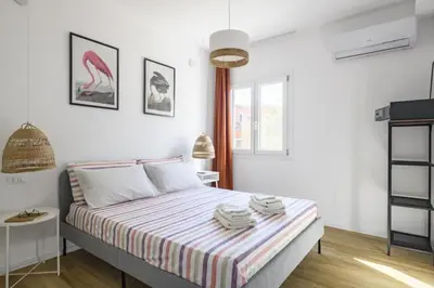 Letto o letti in una camera di Naked House Sardinia