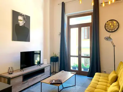 TV o dispositivi per l'intrattenimento presso Elegant Studio in Cagliari, 60 m² with balcony and view