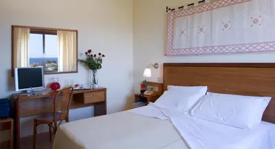 Letto o letti in una camera di Hotel Califfo
