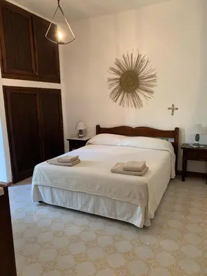 Letto o letti in una camera di La Terrazza sul Mare