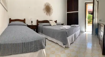 Letto o letti in una camera di La Terrazza sul Mare