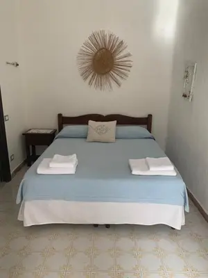 Letto o letti in una camera di La Terrazza sul Mare