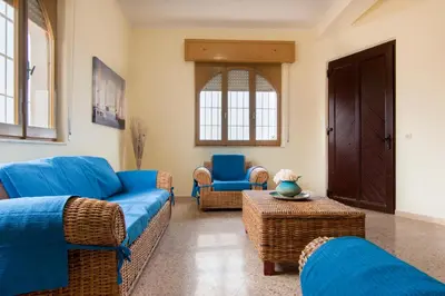 Area soggiorno di VILLA HORUS SAN GIOVANNI SINIS - Villa sul mare con grande giardino privato