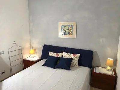 Letto o letti in una camera di Calaverde Pula Il Giardino di Alessandra