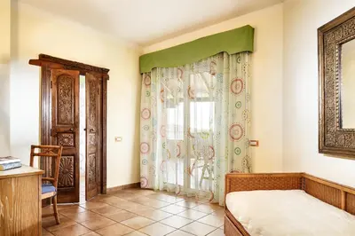Letto o letti in una camera di Cruccùris Resort - Adults Only