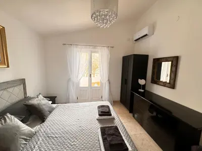 Letto o letti in una camera di Villa Silmar