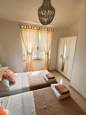 Letto o letti in una camera di Villa Silmar