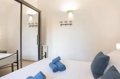 Letto o letti in una camera di Sa Perla Marina - FREE WIFI - 500 mt from the beach