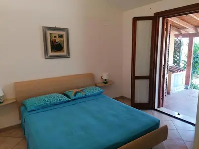 Letto o letti in una camera di casa vacanza mika