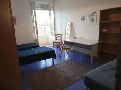 Letto o letti in una camera di Large and cosy apartment in the centre of Cagliari