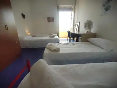 Letto o letti in una camera di Large and cosy apartment in the centre of Cagliari
