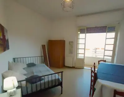 Area soggiorno di Large and cosy apartment in the centre of Cagliari