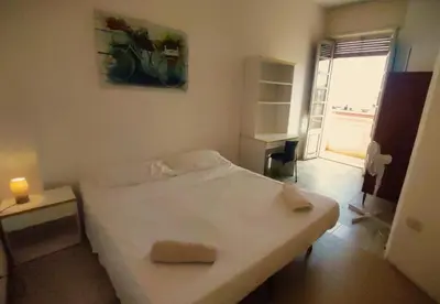 Letto o letti in una camera di Large and cosy apartment in the centre of Cagliari