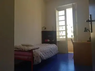 Letto o letti in una camera di Large and cosy apartment in the centre of Cagliari