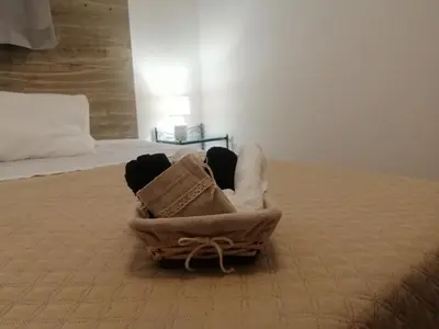 Letto o letti in una camera di Domo Biriala