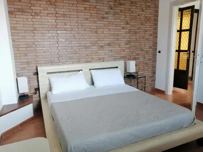 Letto o letti in una camera di Domo Biriala