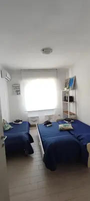Letto o letti in una camera di Vistamare maddalena spiaggia