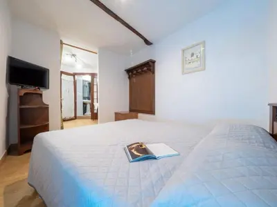 Letto o letti in una camera di Lamarmora 26