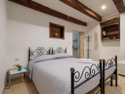 Letto o letti in una camera di Lamarmora 26