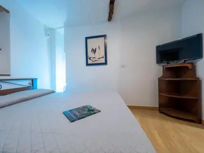 Letto o letti in una camera di Lamarmora 26