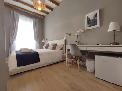 Letto o letti in una camera di Manno Rooms Affittacamere