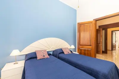 Letto o letti in una camera di Coastal Home
