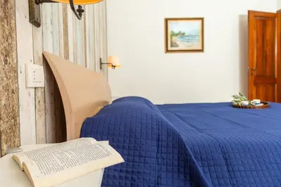 Letto o letti in una camera di Coastal Home