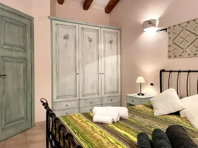 Letto o letti in una camera di Chia al mare