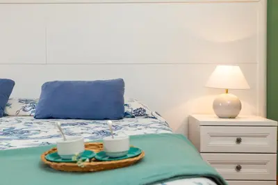 Letto o letti in una camera di La Casa sulla Piazza - con giardino