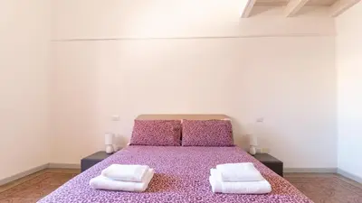 Letto o letti in una camera di Xenia Boutique House Garibaldi