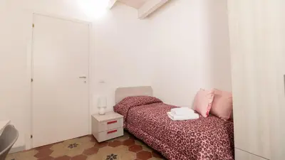 Letto o letti in una camera di Xenia Boutique House Garibaldi