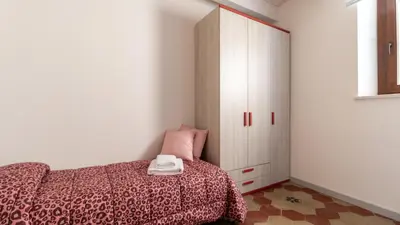 Letto o letti in una camera di Xenia Boutique House Garibaldi