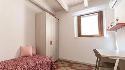 Letto o letti in una camera di Xenia Boutique House Garibaldi